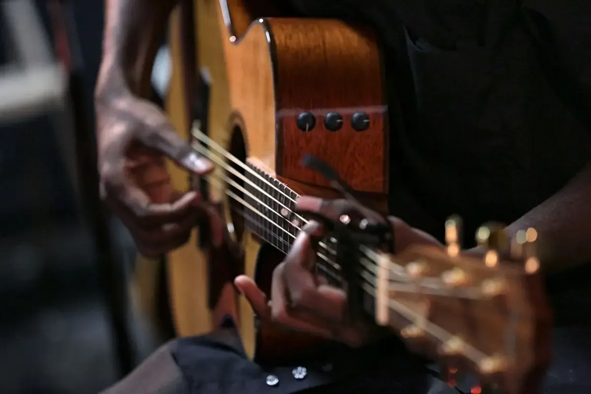 Guitarist playing healing songs